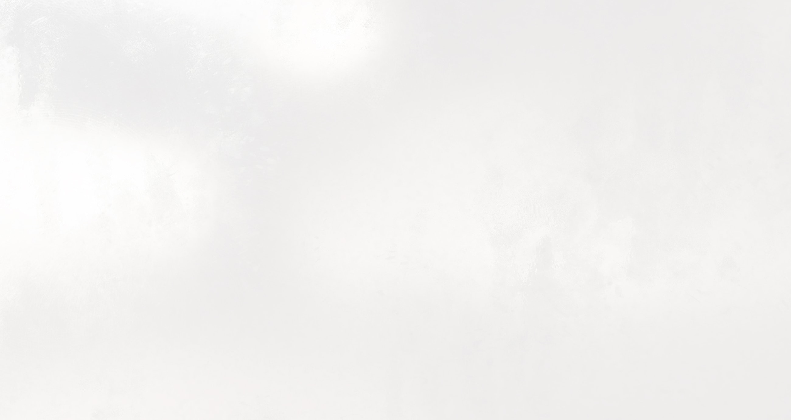 Abstract white texture with soft gradients.