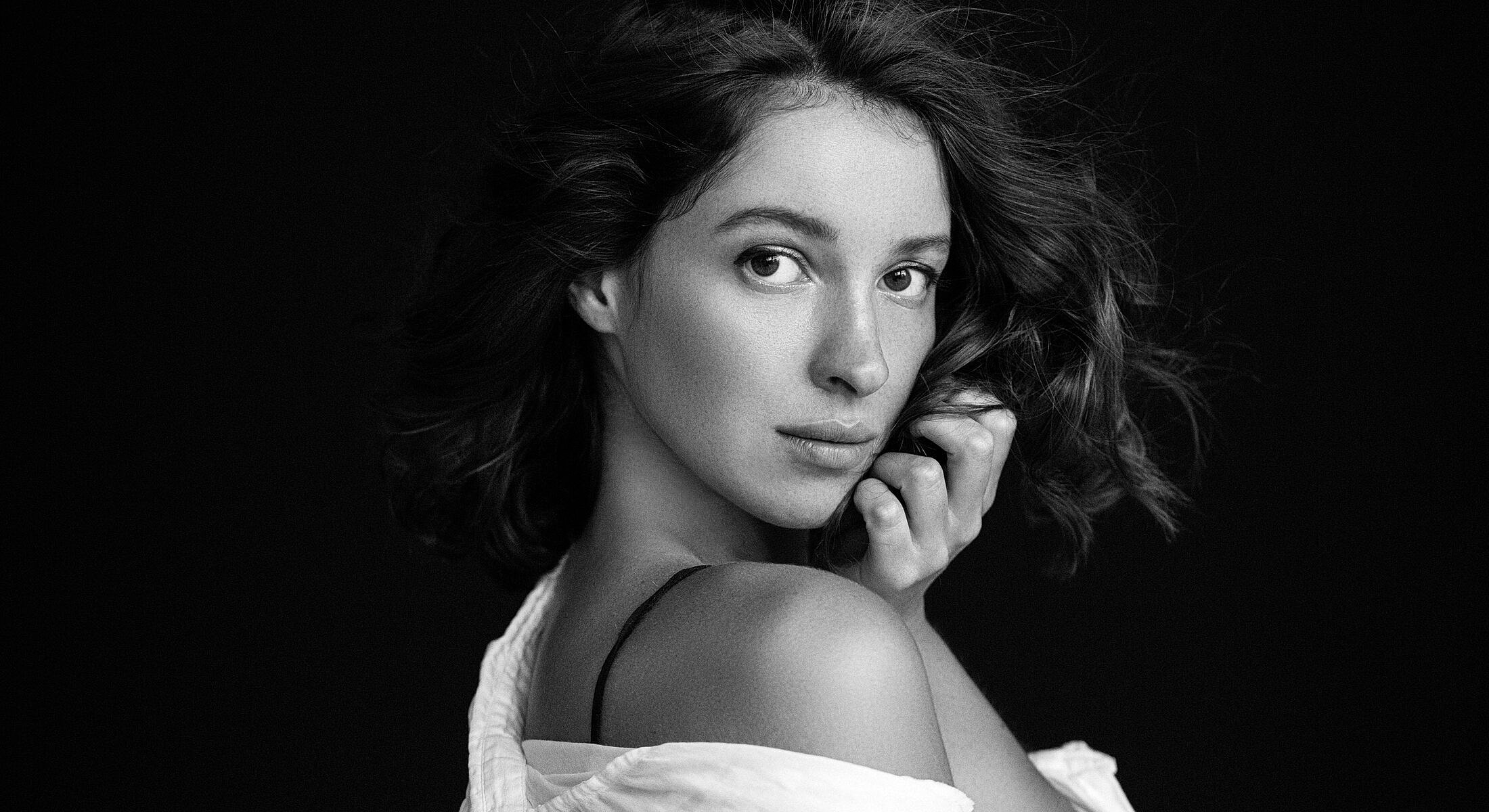 Black and white portrait of a woman.
